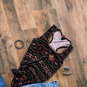 red, black, brown aztec top.